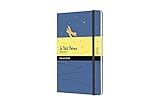 El paquete incluye un cuaderno con tapa dura, cierre elástico y diseño rayado, disponible en formato grande de 13 x 21 cm, 192 páginas, color azul