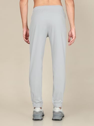 Image of TECHNOSPORT Men Mid Rise Regular Fit Solid Stretchable Joggers, Techno Dry for Regular Use and Sports
