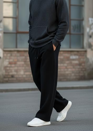 Image of Aesthetic Gothic Wide Leg Pants for Men | Tribal Print Baggy Streetwear | Oversized Track Pants with Elastic Waist | Black and White Relaxed Fit Bottoms