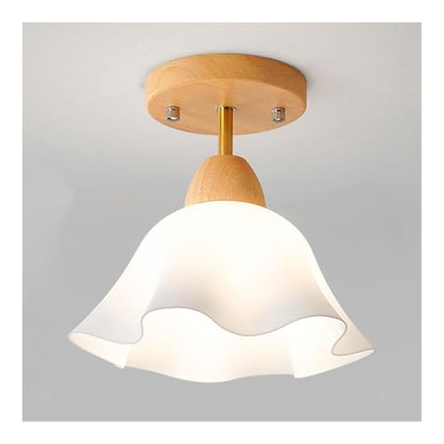 Plafond en bois et acrylique pour illuminer un couloir sombre et l'entrée