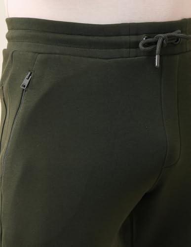 Image of U.S. Polo Assn. Men's Green Solid Mid Rise Cotton Drawstring Slim Fit Flat Front Slit Pocket Track Pants