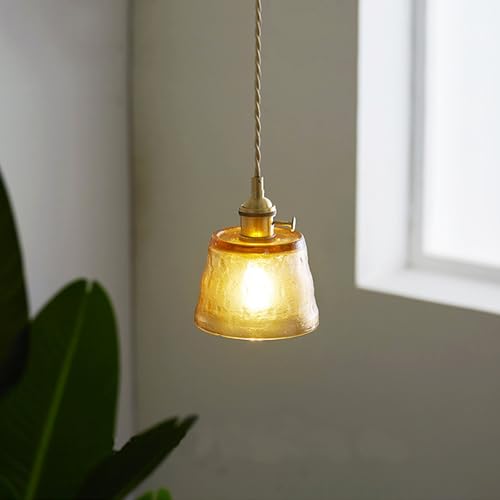 Lampe suspension en verre industriel pour illuminer chaleureusement votre salle à manger