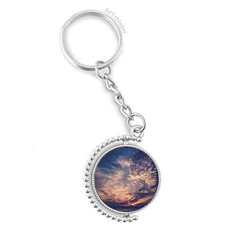 Llavero rotativo contra pérdida de llaves con diseño de cielo azul visible