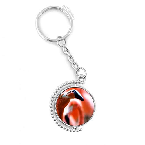 Llavero de flamenco con soporte giratorio ideal para mochilas de viaje