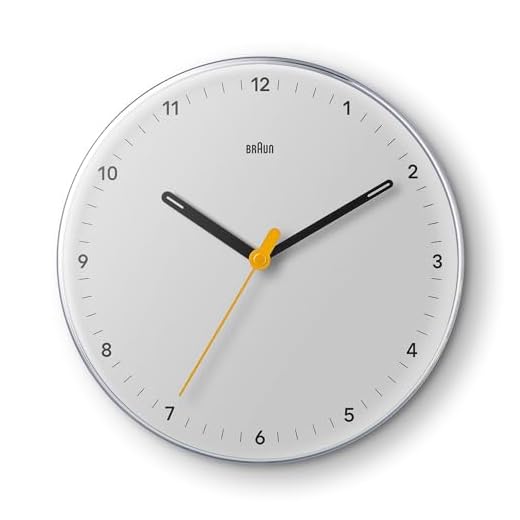 Braun Classic Analogue Wall Clock with Silent Sweeping Quartz Movement, Easy to Read, 23cm Diameter in White, Model BC26W.