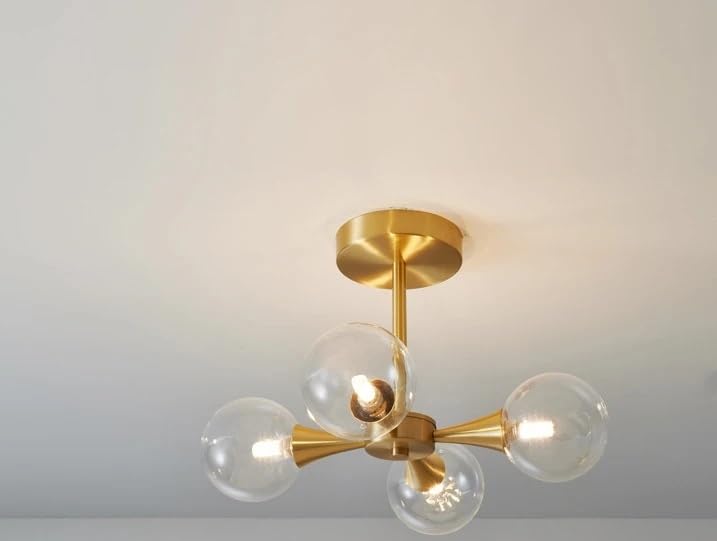 Lustre minimaliste à LED aux finitions cuivrées de haute qualité pour chambre élégante