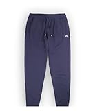 Pantalon molleton essentiel. Pantalon molleton léger avec broderie 4Flo, coupe décontractée et bas resserrés.. Notre mannequin studio mesure 1m86 et porte une taille 32.