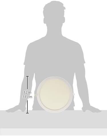 Silhouette of a person with the LED downlight, showing its 12 inch (31 cm) diameter for scale