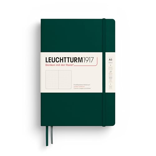 A forest green Leuchtturm1917 A5 hardcover dotted notebook with elastic closure.