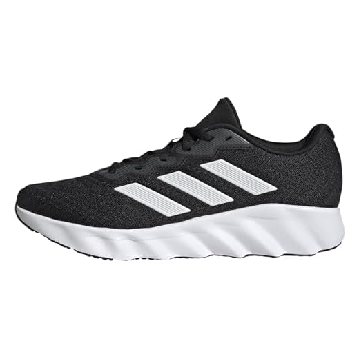 adidas Switch Move Running Shoes, Sneaker Unisex - Adulto, Carbon Black Footwear White Grey Six, 42 2/3 EU