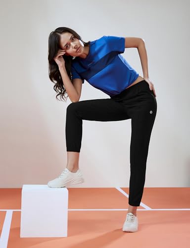 Image of TECHNOSPORT Women's Relaxed Fit Active Sports Joggers with DURACOOL Technology Mid Rise Drawstring Track Pants with Pockets Moisture Wicking Polyester Athleisure Workout Running Lounge Wear