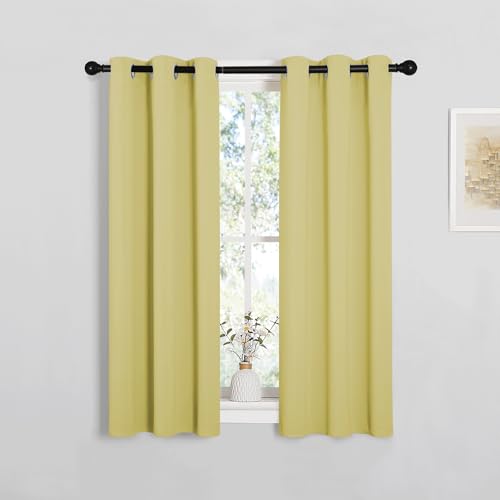 Image of NICETOWN Window Curtain Panels, Thermal Insulated Solid Grommet Blackout Draperies /Drapes for Basement (Paler Yellow, 1 Pair, 29 by 45-inch)