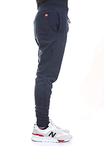 New Balance MP11590, Pantalone Tuta Uomo (Blue, L)...