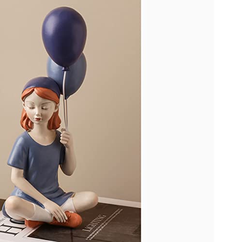 Statue fille à la boule décor de table basse pour salon moderne