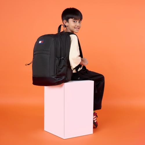 Image of Tommy Hilfiger Professional School Backpack Stud - Black | Durable Water-Resistant Bag for Teens with Signature Metal Logo | 3 Compartments | Soft File Sleeve & Integrated Rain Cover | 30L Capacity