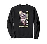 Este diseño fresco y lindo está inspirado en el papel de Houston en misiones y avances de cohetes de la NASA. El diseño cuenta con Houston y la ciudad espacial en un diseño inspirado en el espacio y un astronauta sumergiendo la luna como un baloncesto.