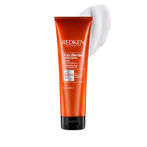 Image of Redken Frizz Dismiss Rebel Tame Leave-in Cream, 250 ml | Anti-frizz treatment cream with a smoothening complex and heat protection. Tames and manages dry, frizzy hair.