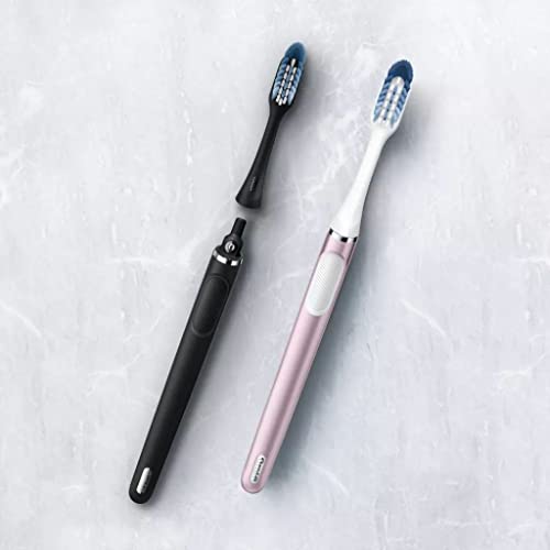 Brosse à dents manuelle Oral-B Clic quartz rose avec tête interchangeable et support