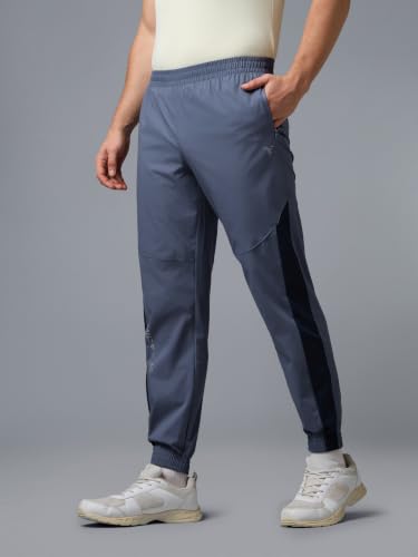 Image of TECHNOSPORT Men's Regular Fit Joggers with Zip Pockets, TECHNOLITE Quick Dry Stretchable Lightweight Track Pants for Gym Running and Casual Wear