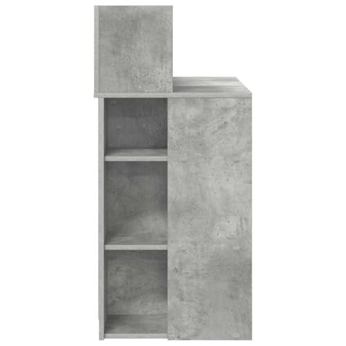 Bureau informatique gris béton avec étagères de rangement pour petit espace