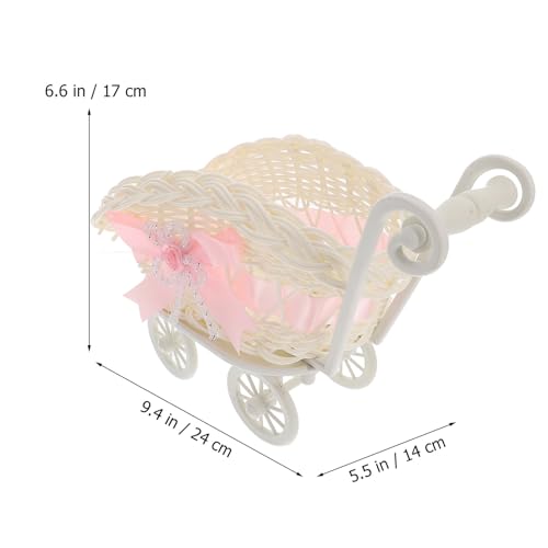 Cesta de dulces rosa tipo cochecito que soluciona la decoración de centros de mesa 2