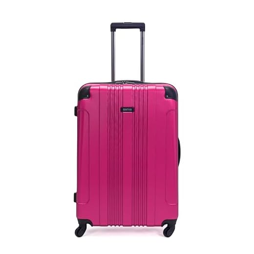 How many lbs checked baggage luggage spirit airline Kenneth Cole Lightweight Hardshell Luggage