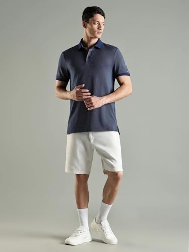 Image of Tommy Hilfiger Solid Regular Fit Cotton Polo T-Shirt