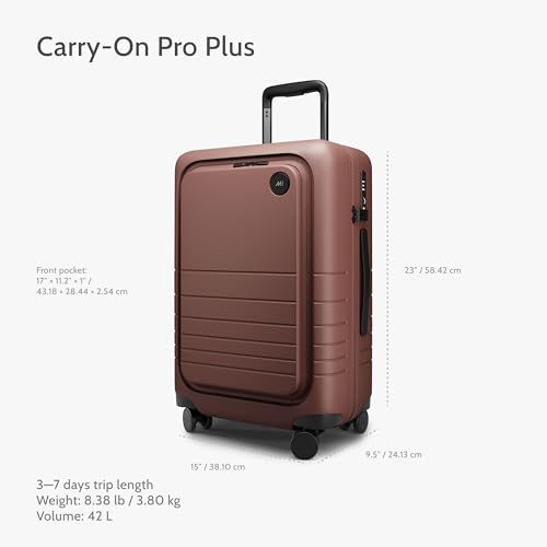Image of Monos Carry-On Pro Plus Luggage 23 Inch - Hardside Spinner Suitcase with TSA Lock & Laptop Front Pocket | Airline Approved, 42L Polycarbonate Rolling Carry On | Fits 16 inch Laptop | Terracotta, Red