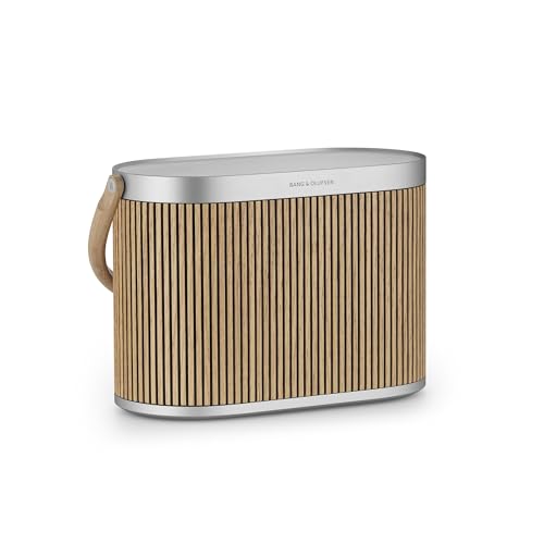 Bang & Olufsen Beosound A5 – Bluetooth-Lautsprecher, lauter Klang und tragbarer Bluetooth-360°-Lautsprecher mit USB-C-Kabel und integriertem kabellosen Qi-Ladepad - Oak