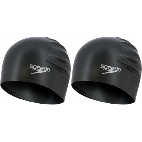 Why do swimmers wear two swim caps?