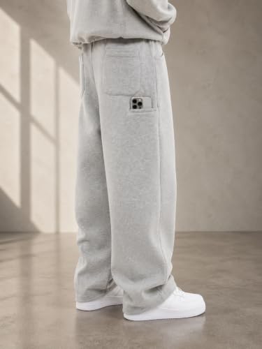 Image of 320 GSM Heavyweight Baggy Track Pants for Men | Oversized Fleece Sweatpants | Relaxed Fit Joggers with Deep Side Pockets | Winter Casual Lounge Wear | Elastic Waist with Drawstring