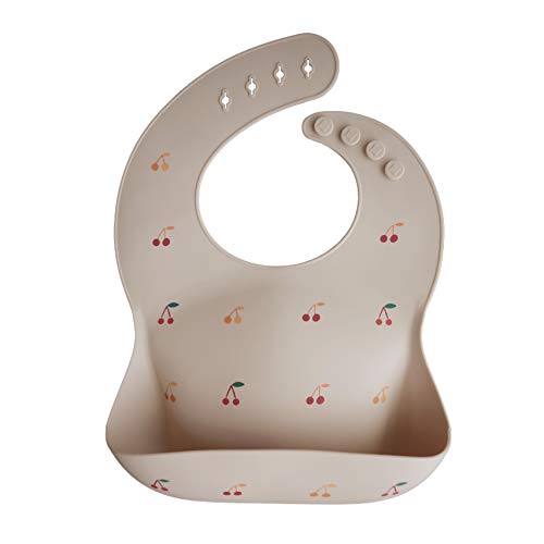 Image of mushie Silicone Baby Bib | Adjustable Fit Waterproof Bibs (Cherries)