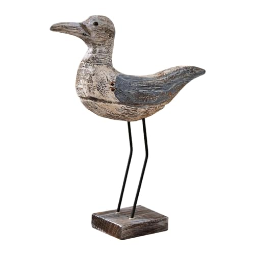 Figurine d'oiseau de mer sur une étagère de chambre style bord de mer relaxant