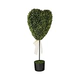 Plantas artificiales en maceta, estilo moderno