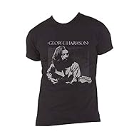 An official licensed unisex soft-style cotton Tee featuring the George Harrison 'Live Portrait' design motif; This high quality t-shirt is available in a black colorway Short Sleeves soft-style cotton