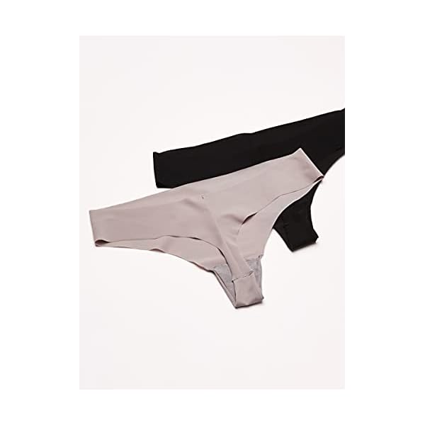 Calvin Klein Women's Invisibles Seamless Thong Panties, 7 Pack, Black/White/Bare/Silverlock/Undertone/Subtle Bloom/Speakeasy, Small