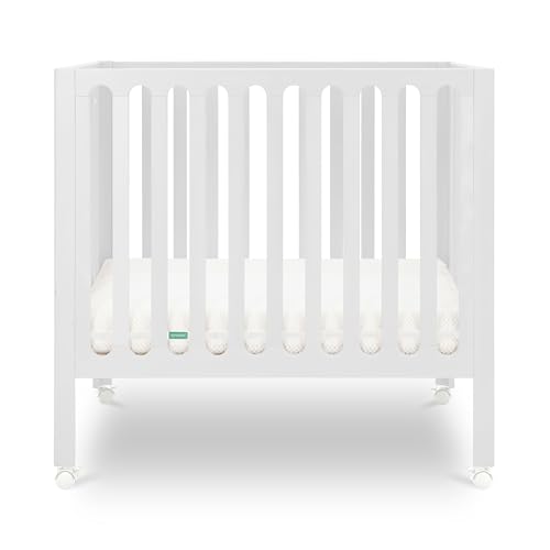 Newton Baby Mini Crib Solid Beech Wood with Wheels in White Color, Adjustable Mattress Height, Ultra-Safe Non-Toxic Finish, Mini Crib Mattress Included