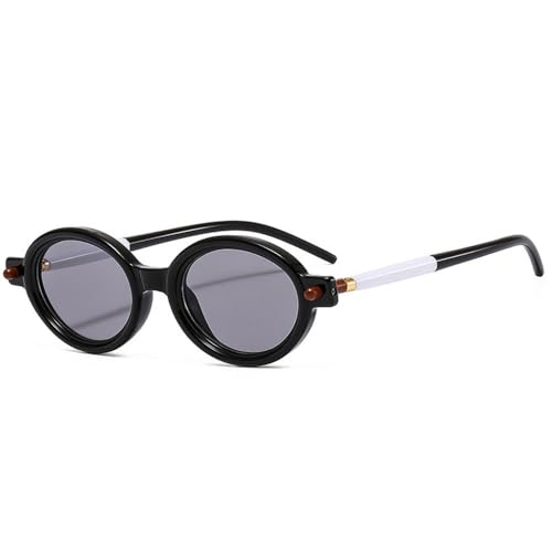 Lunettes de soleil ovales aux finitions rivets punk et verres haute définition transparents