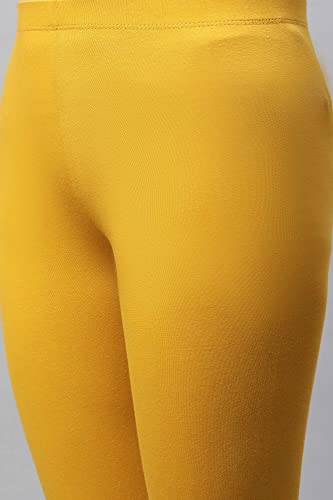 Image of Aurelia Yellow Solid Cotton Blend Leggings for Women