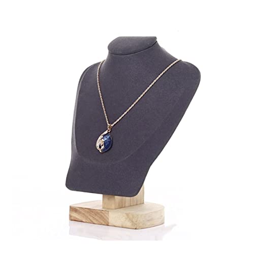 Présentoir à bijoux en bois contre les colliers emmêlés sur le buste