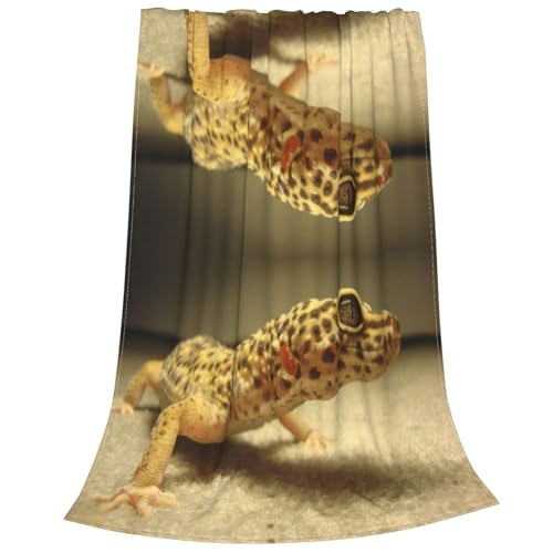 Couverture polaire léopard pour cocooning sur le canapé 152x127 cm