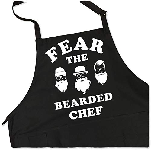 ApronMen - Fear The Bearded Chef - Funny BBQ Apron for Dads - 1 Size Fits All Chef Quality Cotton 4 Utility Pockets, Adjustable Neck and Extra Long Waist Ties - Black Color