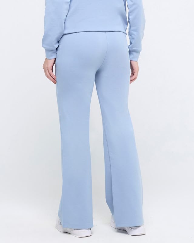 Image of HUNNIT Essential Flare Pants for Women with Zip Pockets | Mid Waist Solid Cotton Tapered Flare Pants | Bootcut Flared Trousers with Wide Elastic Waistband | Relaxed Fit Flared Trouser
