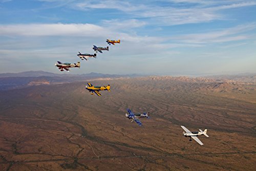 Posterazzi PSTSGR100139M Extra 300 aerobatic aircraft fly in formation during APS training in Mesa...