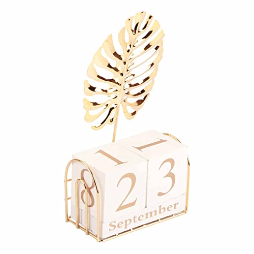 Calendario manual de madera rústica para evitar el desorden digital en el escritorio de casa