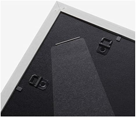 Back of the IKEA Ribba picture frame showing the stand and wall hangers.