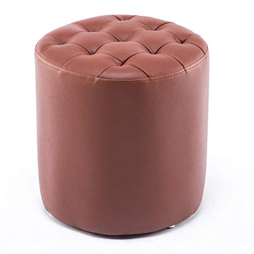 Tabouret en cuir autour de la table basse pour un café convivial