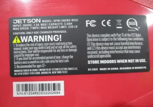 Warning label on Jetson Hoverboard with safety instructions