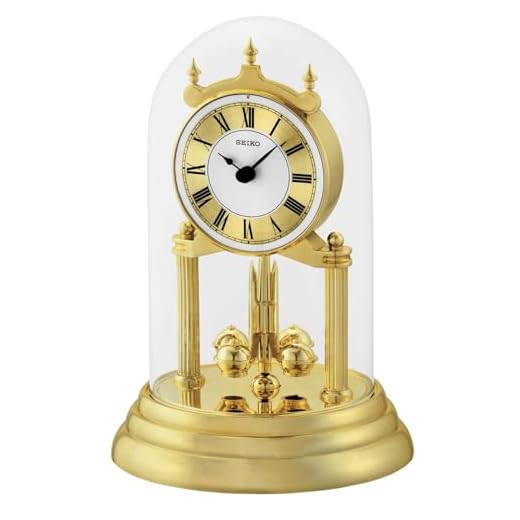 Seiko QHN 006 GLH Anniversary Mantel Clock with Glass Dome, Rotating Pendulum, 9 . 25 x 7 Inches