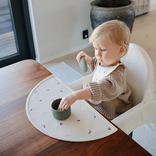 Image of mushie Silicone Baby Bib | Adjustable Fit Waterproof Bibs (Circus)